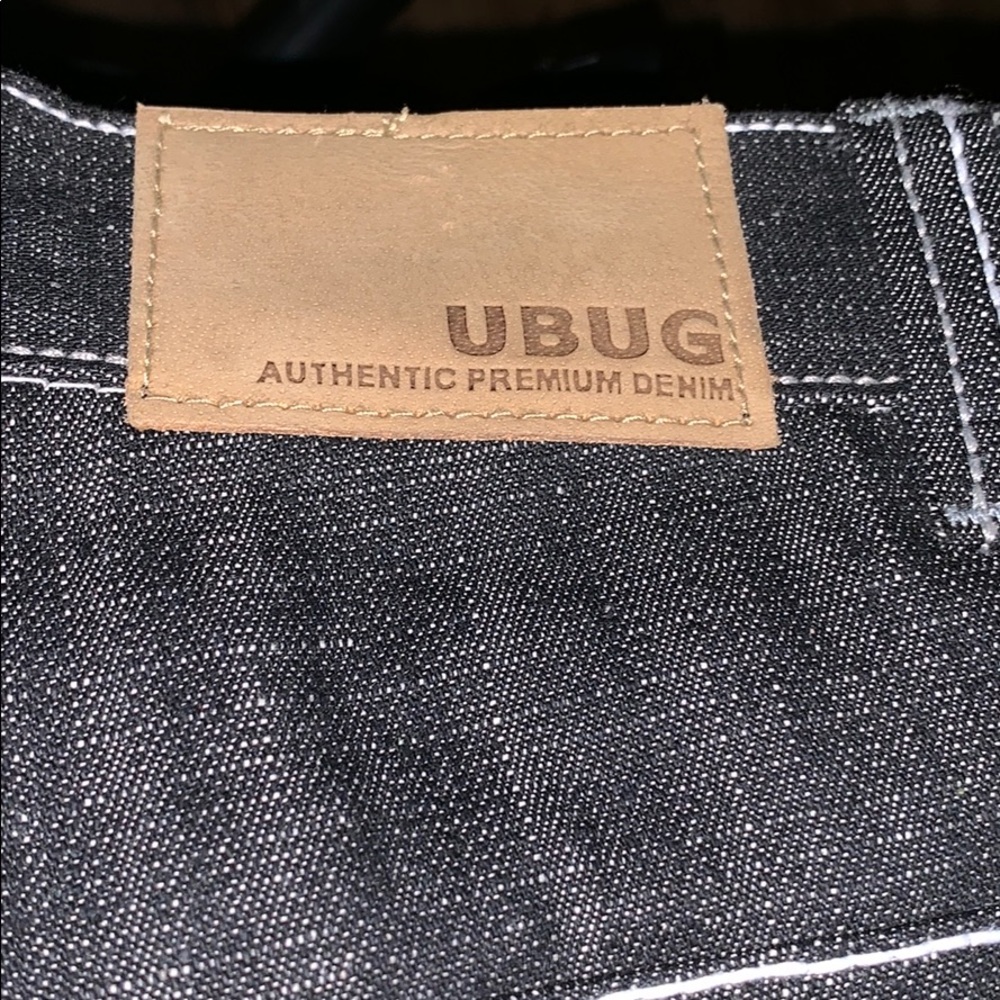 Black dark wash rinse jeans with white seams